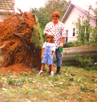 Friend and my daughter by fallen tree