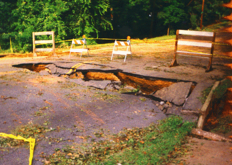 Another view of the hole in the road